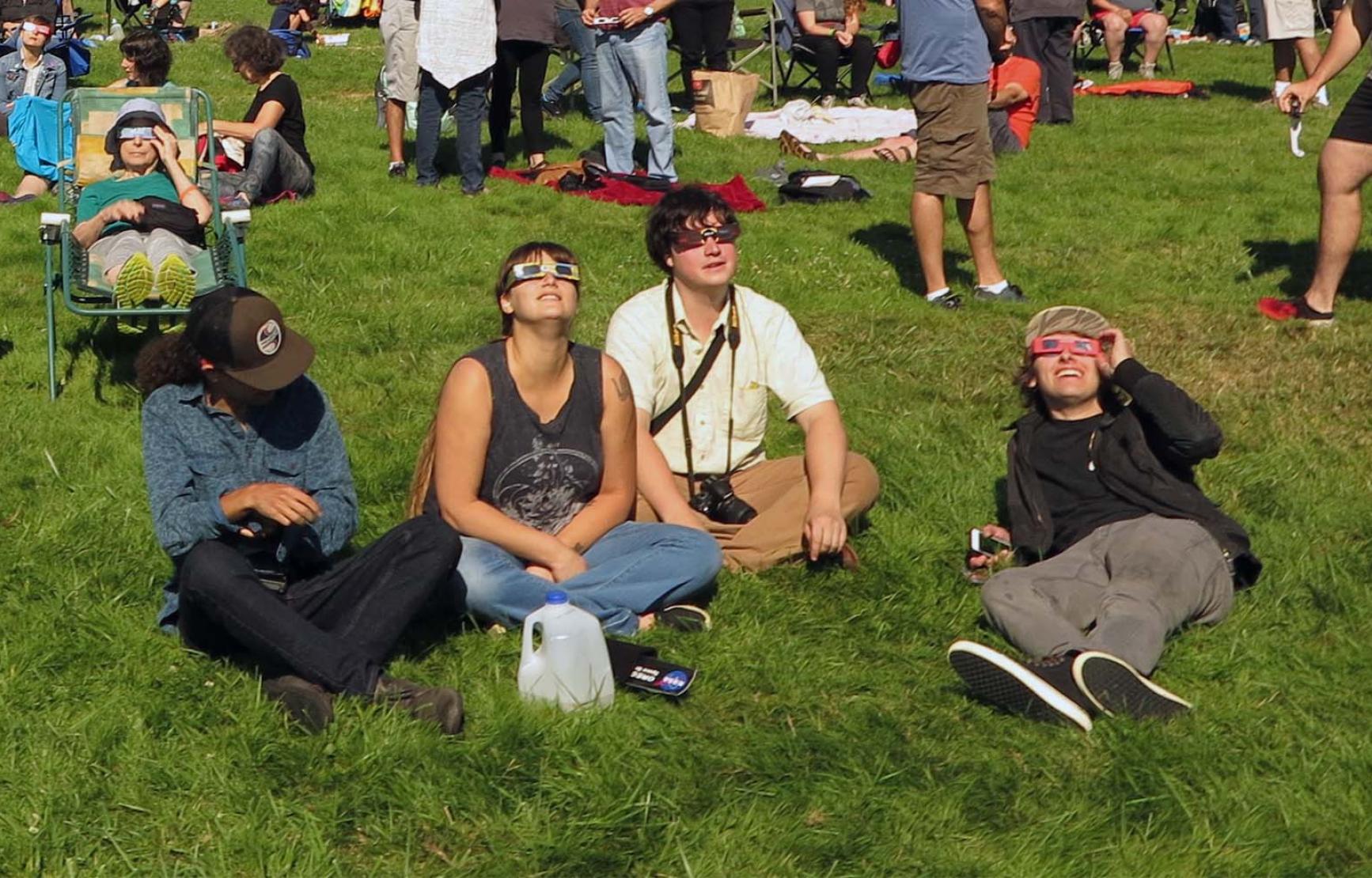 People gathered in a field for the 2017 eclipse.