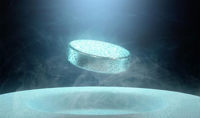 superconductor levitating small cylinder